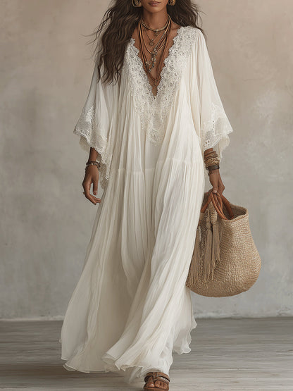 Indara • Vestido largo de blanco con escote en V